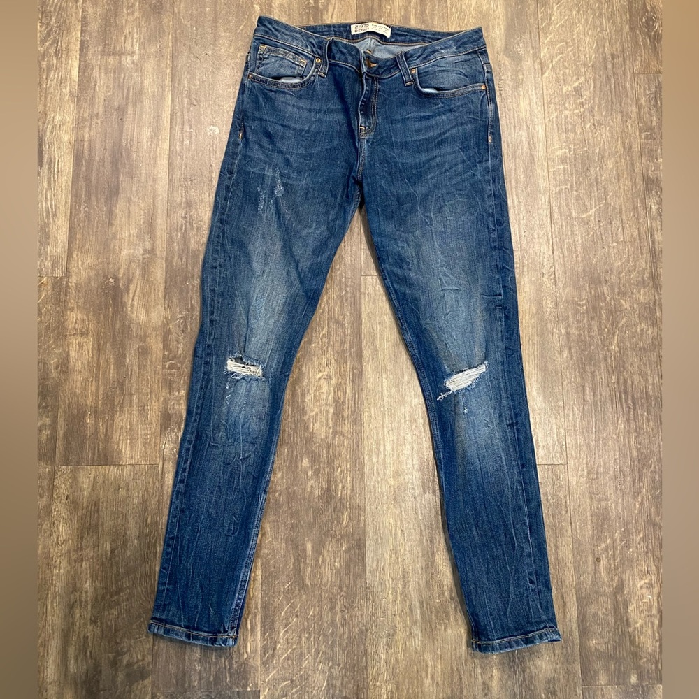 Zara women’s jeans size US 8 skinny denim w/ rips near knees. Lightly worn.